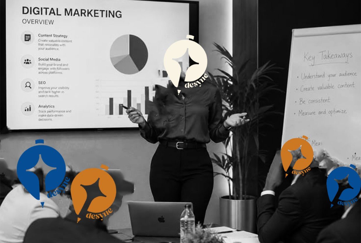 A presenter leading a strategy session, with Desyne logo marks in place of faces